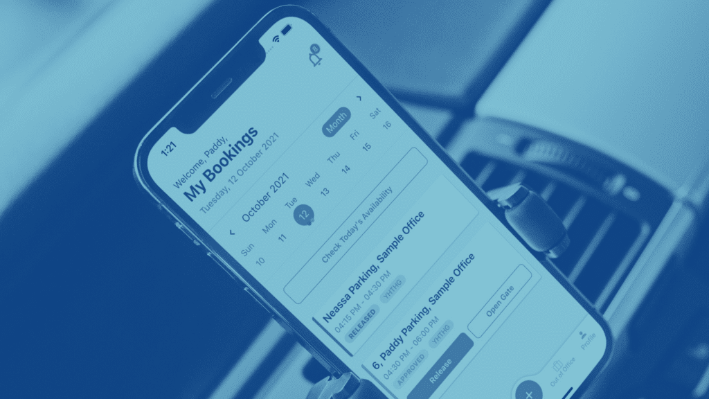 A smartphone displaying a booking app interface placed in a car phone holder. The screen shows reservation details for a parking spot, with options to extend the booking or cancel.