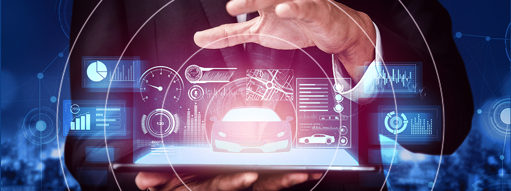 A person holds a tablet displaying various automotive-related holographic interfaces, including charts, gauges, and a car, illustrating advanced vehicle technology and data analysis essential for modern parking lot systems.