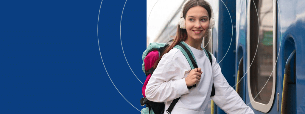 A person with a backpack and headphones smiles while boarding a train, likely thinking about the convenient visitor parking and efficient parking lot management at their destination.