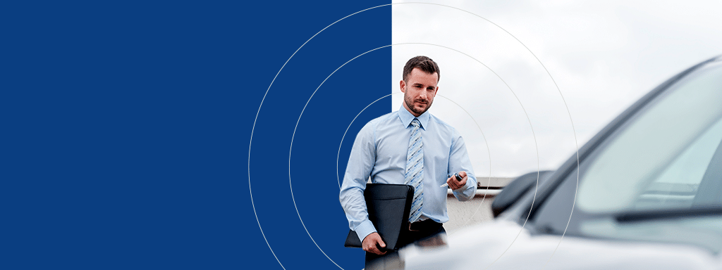 A man in a blue shirt and tie holding a folder and car keys stands near a car, against a split blue and white background with circular patterns, reminiscent of sleek parking lot systems for commercial parking.