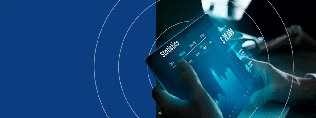 Close-up of hands holding a tablet displaying financial statistics and graphs in a blue-toned environment, seamlessly integrating insights into commercial parking trends.