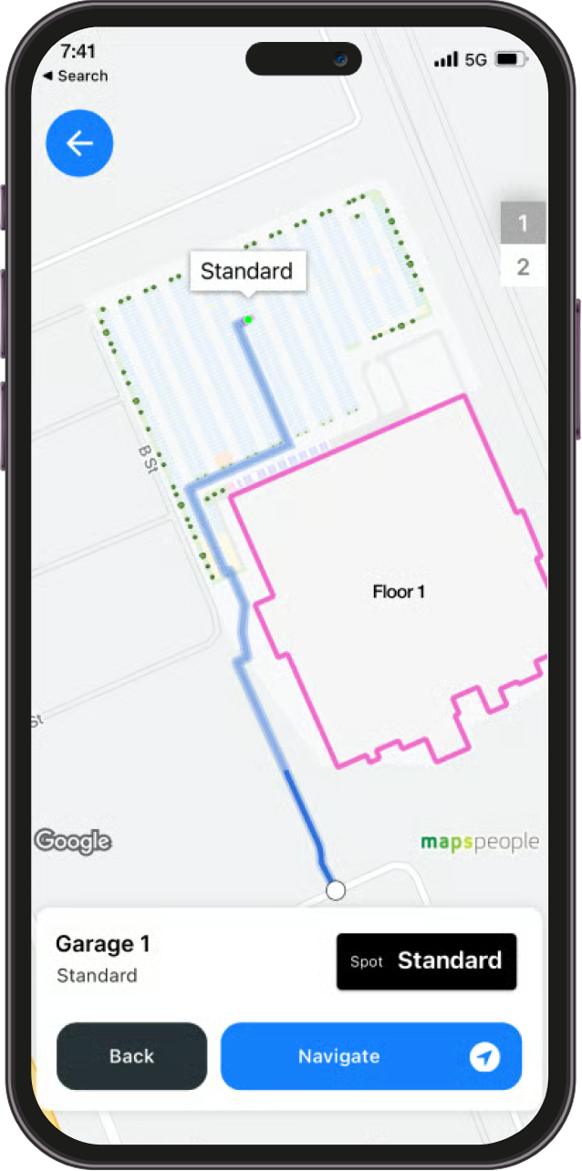 A smartphone screen displays a map with a walking route from a parking spot labeled "Standard" in Garage 1 to an entrance of a building labeled "Floor 1".