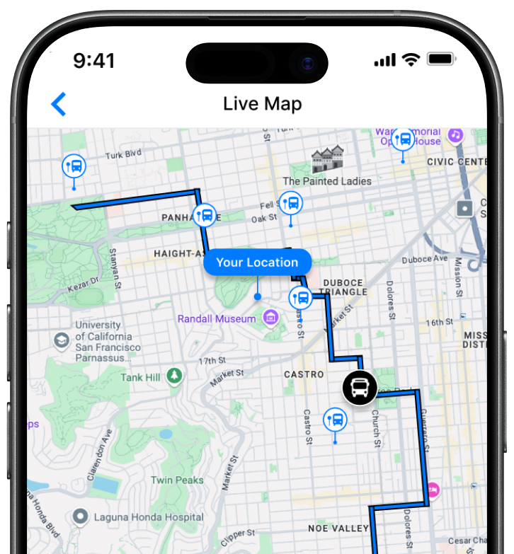 Smartphone screen showing a live map with a marked route passing through various San Francisco neighborhoods, public transit icons, and a “Your Location” indicator.